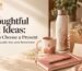 Thoughtful gift ideas featuring a decorative mug, insulated bottle, notebook, pen, and beautifully wrapped present with a ribbon.